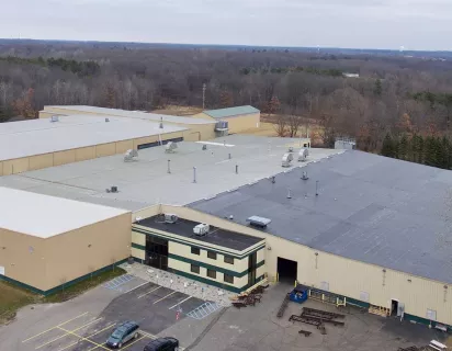 A photo showing the exterior of the Extruded Aluminum building